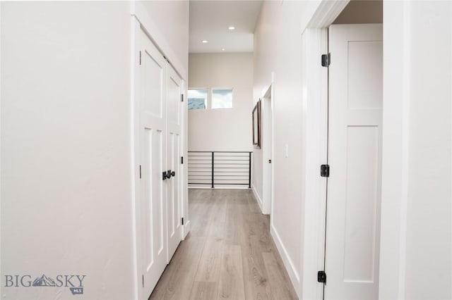 1610 Windrow Dr, Bozeman, MT 59718 - hall with light wood-style flooring, baseboards, and recessed lighting