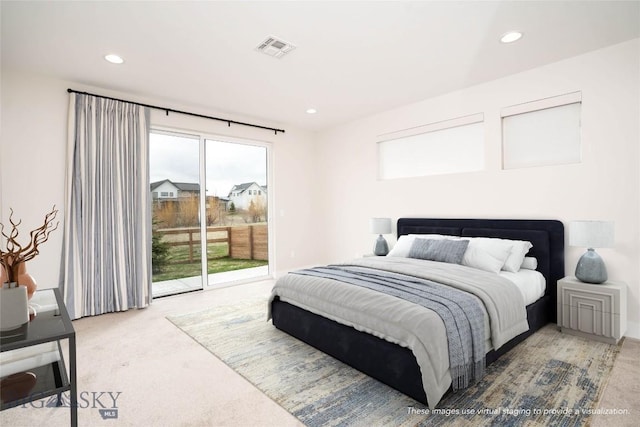 1610 Windrow Dr, Bozeman, MT 59718 - carpeted bedroom featuring access to exterior and recessed lighting