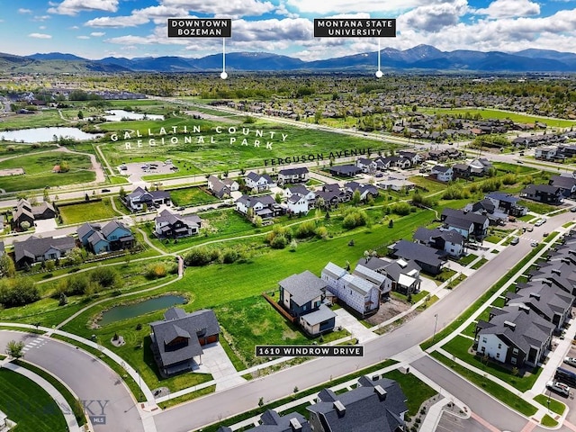 1610 Windrow Dr, Bozeman, MT 59718 - aerial perspective of suburban area with a water and mountain view