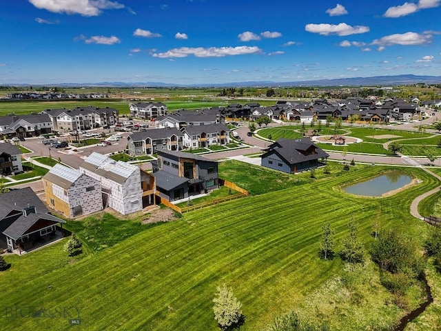 1610 Windrow Dr, Bozeman, MT 59718 - aerial perspective of suburban area with a nearby body of water