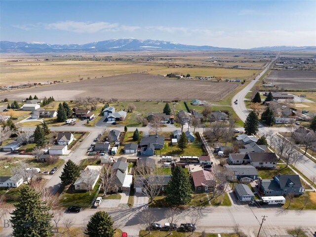 birds eye view of property with a residential view and a mountain view