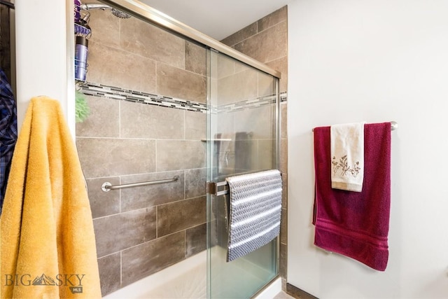 bathroom with a stall shower