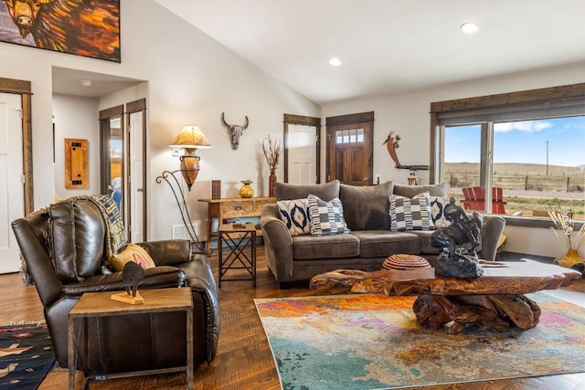 living room with recessed lighting, lofted ceiling, and dark wood-style flooring