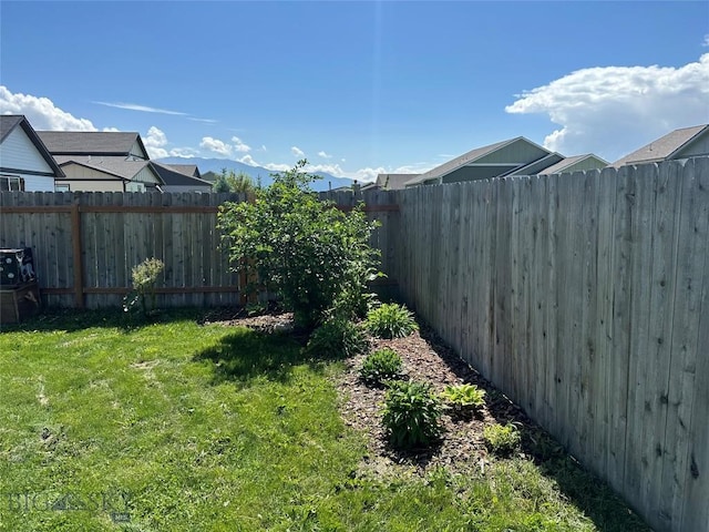 view of yard featuring a fenced backyard