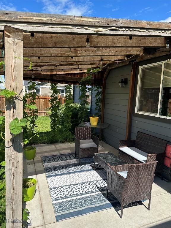1411 Ingomar, Belgrade, MT 59714 - view of patio with a pergola