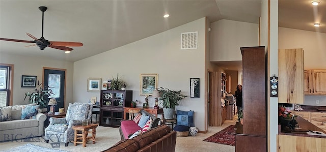 719 Jefferson St, Ennis, MT 59729 - living area featuring a ceiling fan, high vaulted ceiling, and carpet flooring