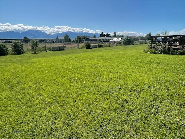 719 Jefferson St, Ennis, MT 59729 - view of yard with a mountain view
