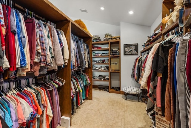 spacious closet featuring carpet floors
