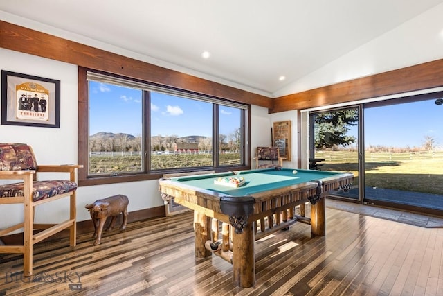 game room featuring a mountain view, vaulted ceiling, recessed lighting, hardwood / wood-style flooring, and pool table