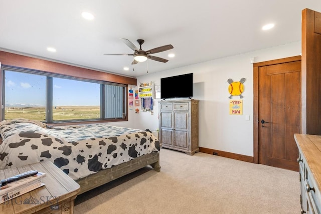 bedroom with recessed lighting, ceiling fan, baseboards, and light carpet