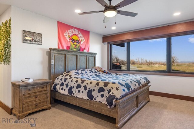 bedroom featuring recessed lighting, a ceiling fan, baseboards, and light carpet