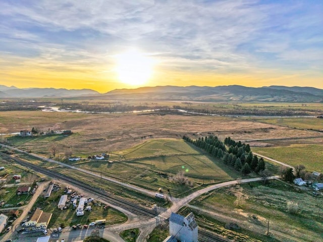 bird's eye view featuring a rural view and a mountain view