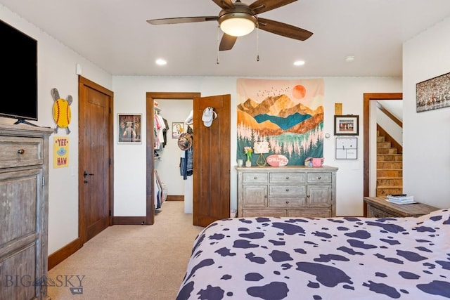 bedroom with light carpet, baseboards, recessed lighting, and a closet