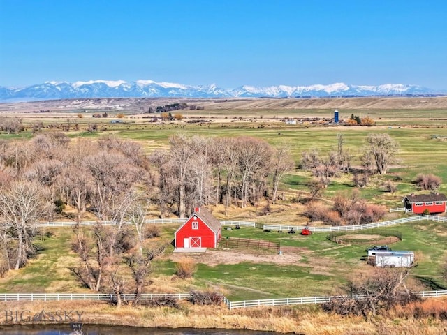 drone / aerial view with a rural view and a mountain view