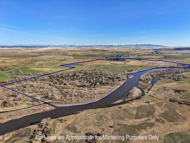 birds eye view of property with a rural view