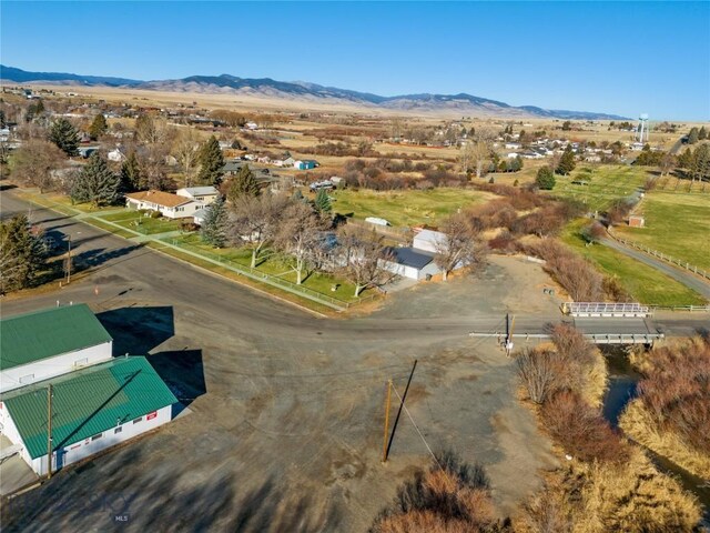 509 1st E, Whitehall, MT 59759 - aerial view of property's location featuring mountains and rural landscape