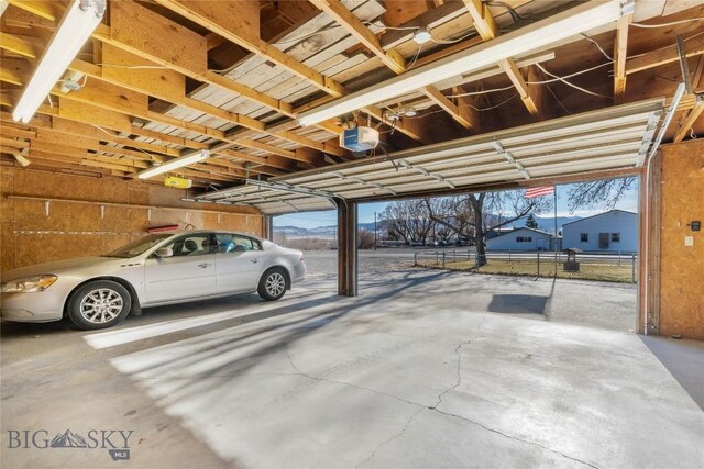 509 1st E, Whitehall, MT 59759 - garage featuring a garage door opener