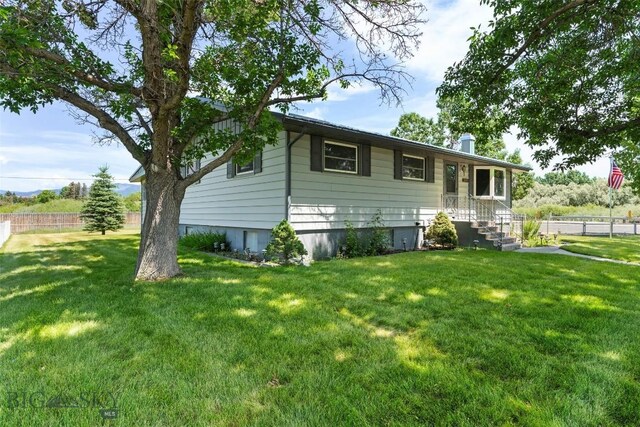 509 1st E, Whitehall, MT 59759 - rear view of property with a chimney