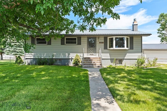 509 1st E, Whitehall, MT 59759 - view of front of property featuring a chimney and a metal roof