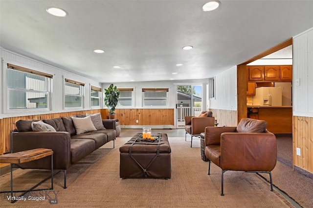 509 1st E, Whitehall, MT 59759 - living area featuring wood walls and recessed lighting