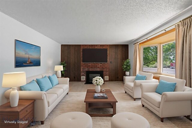 509 1st E, Whitehall, MT 59759 - living room featuring a textured ceiling, light colored carpet, and a brick fireplace
