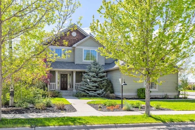 3609 Fieldstone W, Bozeman, MT 59715 - view of front of property featuring a porch and a front yard