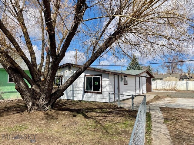 307 W Legion St, Whitehall, MT 59759 - view of property exterior with fence
