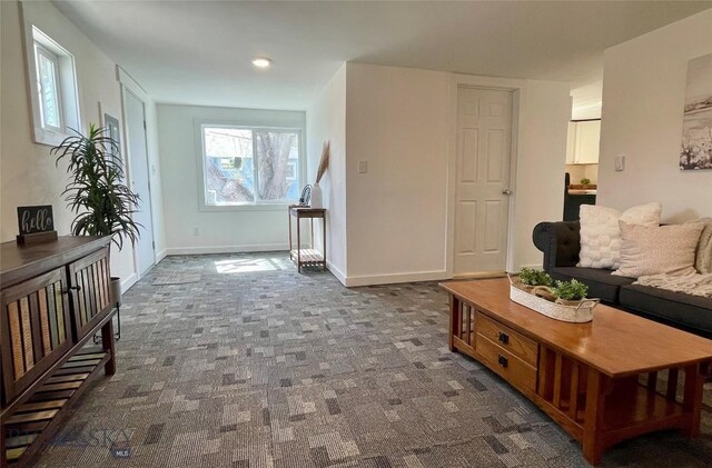 307 W Legion St, Whitehall, MT 59759 - living room with recessed lighting, baseboards, and dark colored carpet
