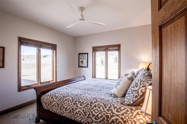 10 Wood Duck Rd, Ennis, MT 59729 - carpeted bedroom featuring baseboards and ceiling fan