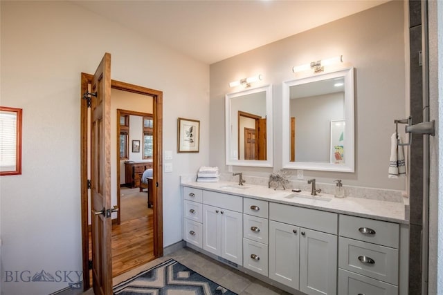 10 Wood Duck Rd, Ennis, MT 59729 - ensuite bathroom with double vanity and tile patterned flooring