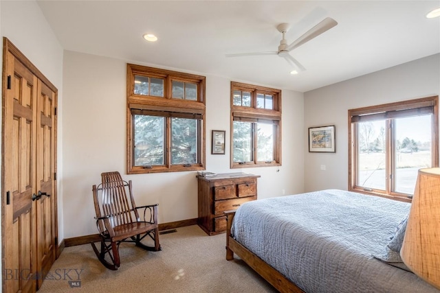 10 Wood Duck Rd, Ennis, MT 59729 - bedroom featuring multiple windows, light carpet, recessed lighting, access to exterior, and ceiling fan