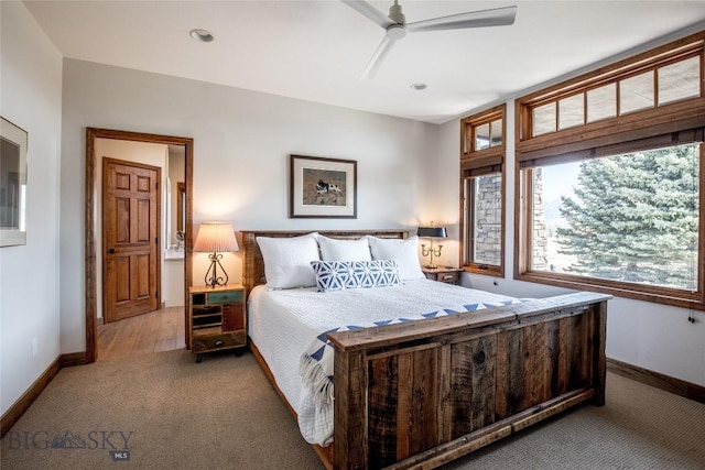 10 Wood Duck Rd, Ennis, MT 59729 - bedroom featuring carpet floors, multiple windows, and ceiling fan