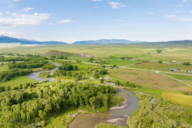 drone / aerial view with a rural view and a mountain view