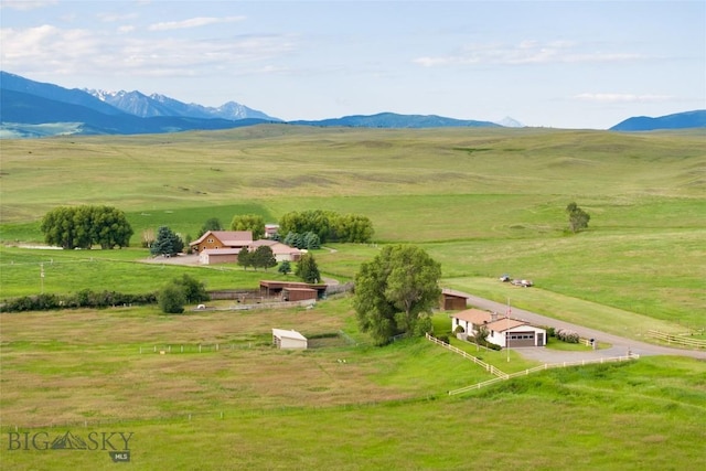 aerial view featuring a rural view and a mountain view
