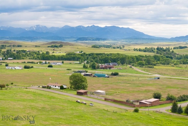 drone / aerial view with a rural view and a mountain view