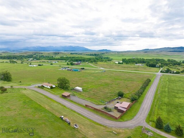 bird's eye view featuring a mountain view and a rural view