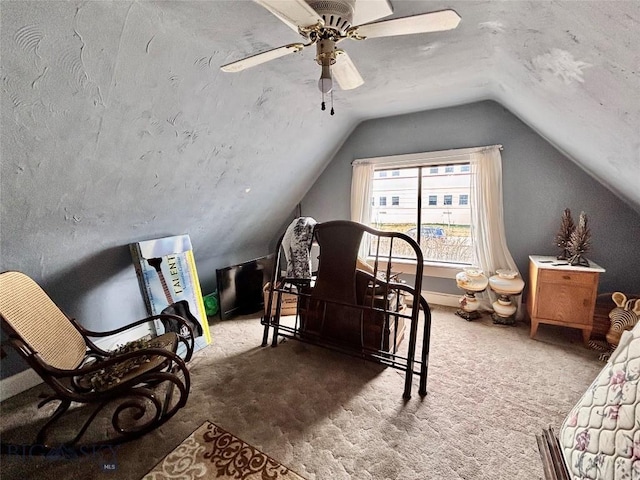 bedroom featuring vaulted ceiling, carpet flooring, and ceiling fan