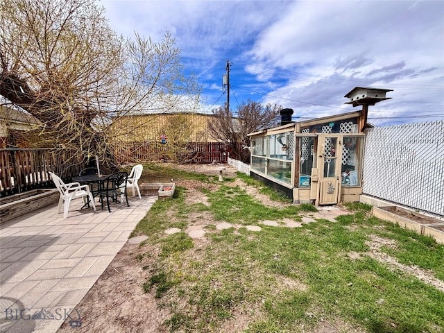 view of yard with a fenced backyard and a patio