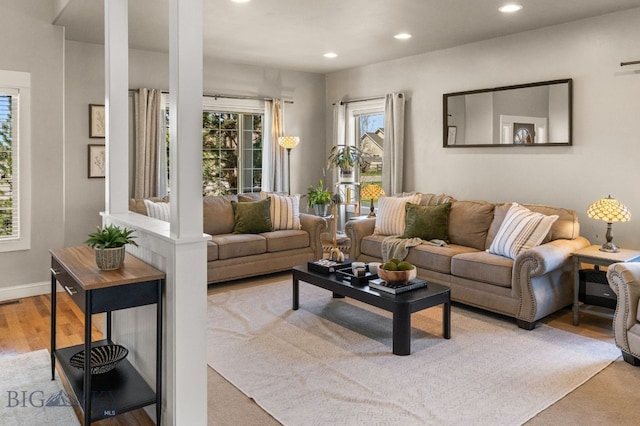 126 Pathfinder Trl, Bozeman, MT 59718 - carpeted living room featuring recessed lighting, plenty of natural light, and baseboards