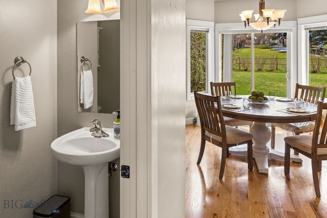 126 Pathfinder Trl, Bozeman, MT 59718 - dining area with wood finished floors and a chandelier