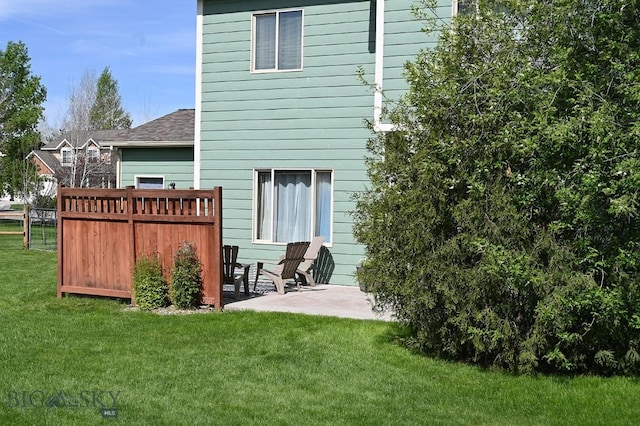 126 Pathfinder Trl, Bozeman, MT 59718 - back of house featuring a patio and roof with shingles