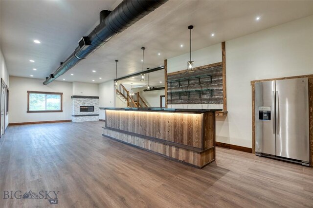 reception with a fireplace and stairway