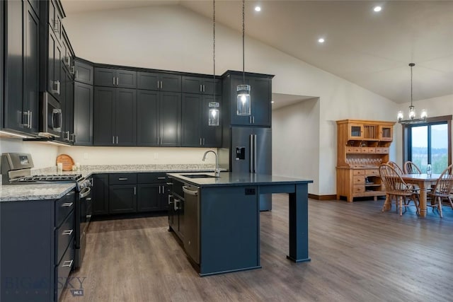 kitchen with a sink, dark wood-style flooring, an inviting chandelier, high vaulted ceiling, and appliances with stainless steel finishes