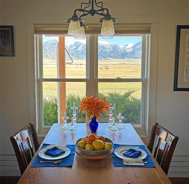 657 Waterloo Rd, Whitehall, MT 59759 - dining room with a chandelier and healthy amount of natural light