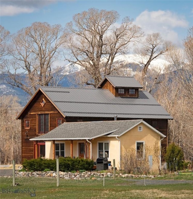 657 Waterloo Rd, Whitehall, MT 59759 - view of front of house with stucco siding and a mountain view
