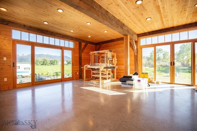 657 Waterloo Rd, Whitehall, MT 59759 - living area with recessed lighting, wooden ceiling, healthy amount of natural light, wood walls, and a mountain view