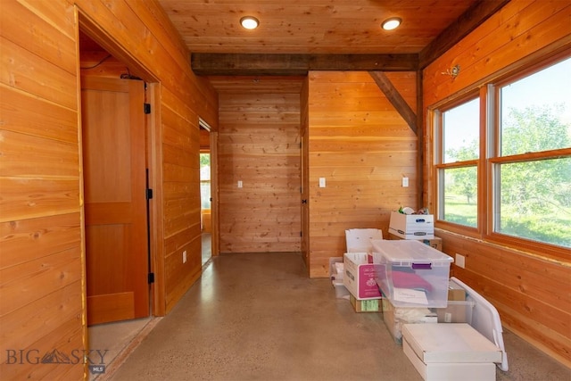 657 Waterloo Rd, Whitehall, MT 59759 - hall featuring wood walls, wood ceiling, recessed lighting, and concrete flooring
