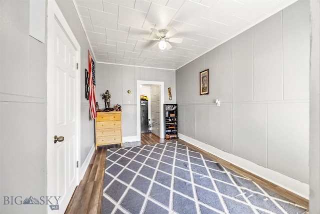 610 Birch, Anaconda, MT 59711 - bedroom featuring dark wood finished floors, baseboards, a ceiling fan, and a decorative wall