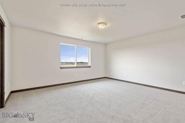 empty room with baseboards, carpet flooring, and visible vents