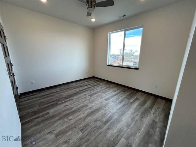 unfurnished bedroom with dark wood finished floors, baseboards, visible vents, recessed lighting, and ceiling fan